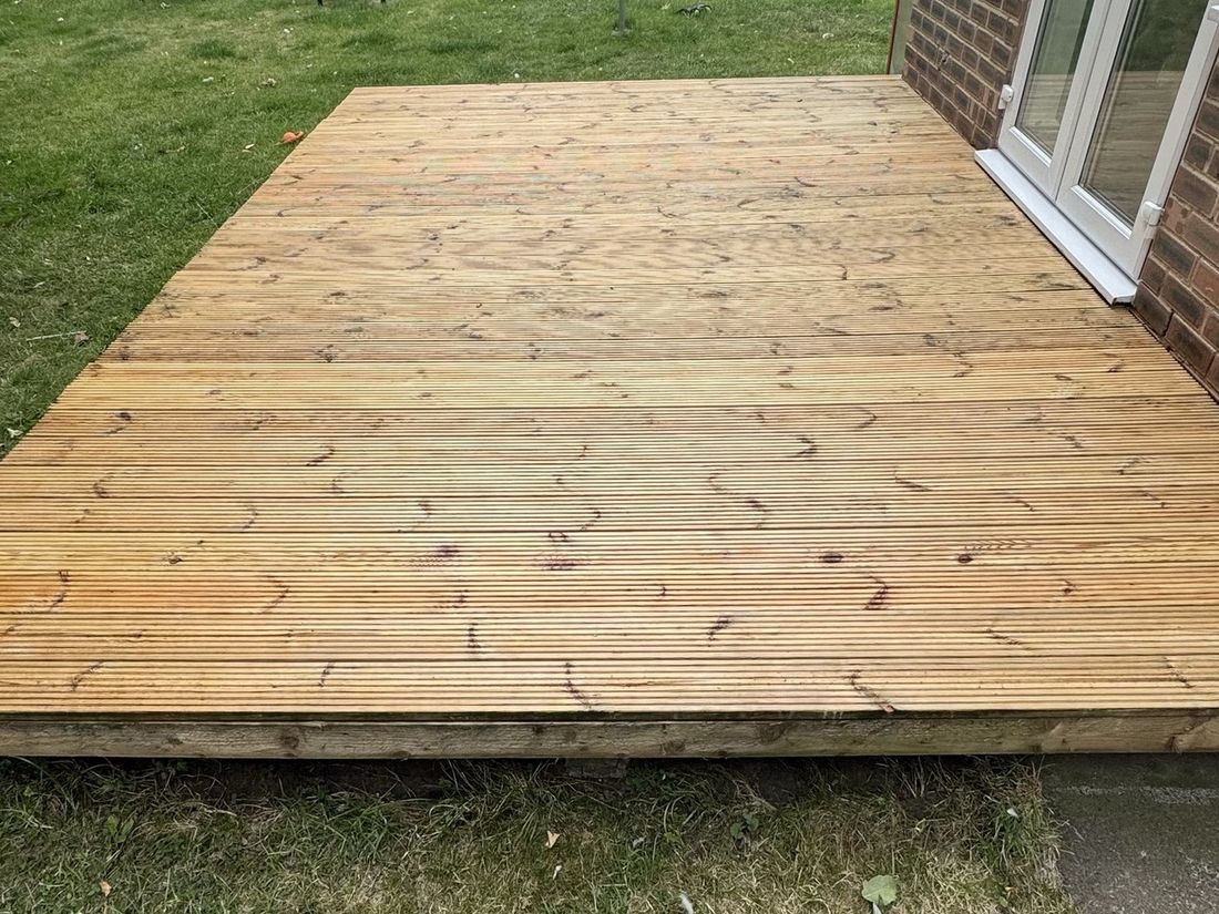 Timber decking after a two-part clean – Mark's own home, Normanby