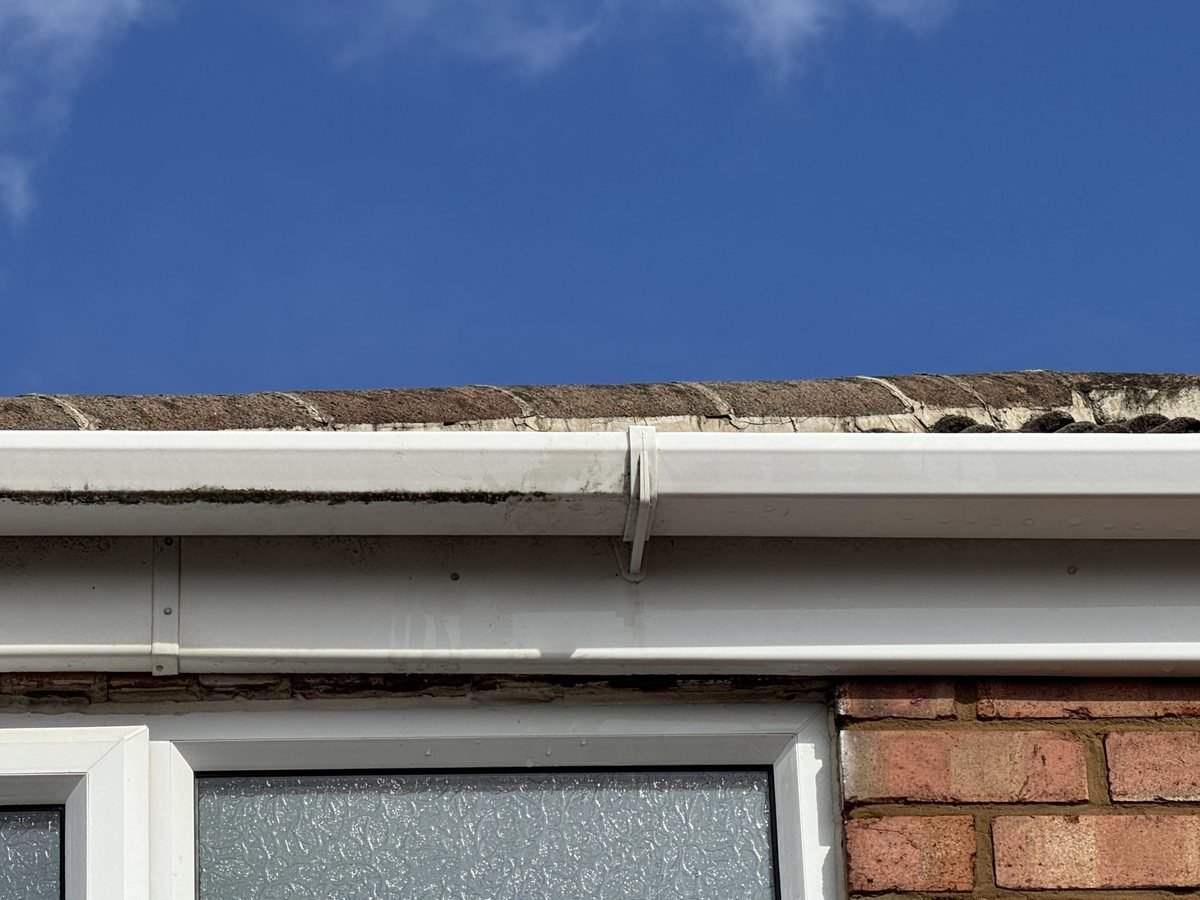 Fascia and gutter half cleaned in Normanby, showing the difference
